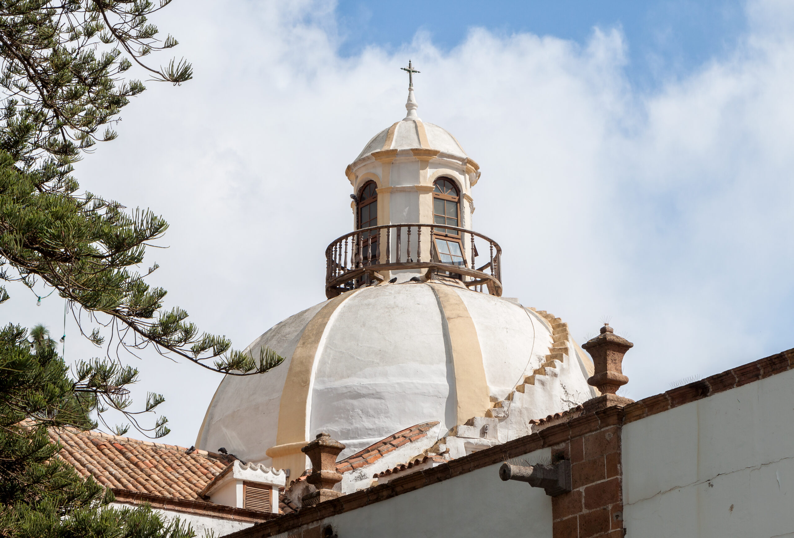 The basilica’s dome and lantern tower rise above Teror’s colonial architecture.