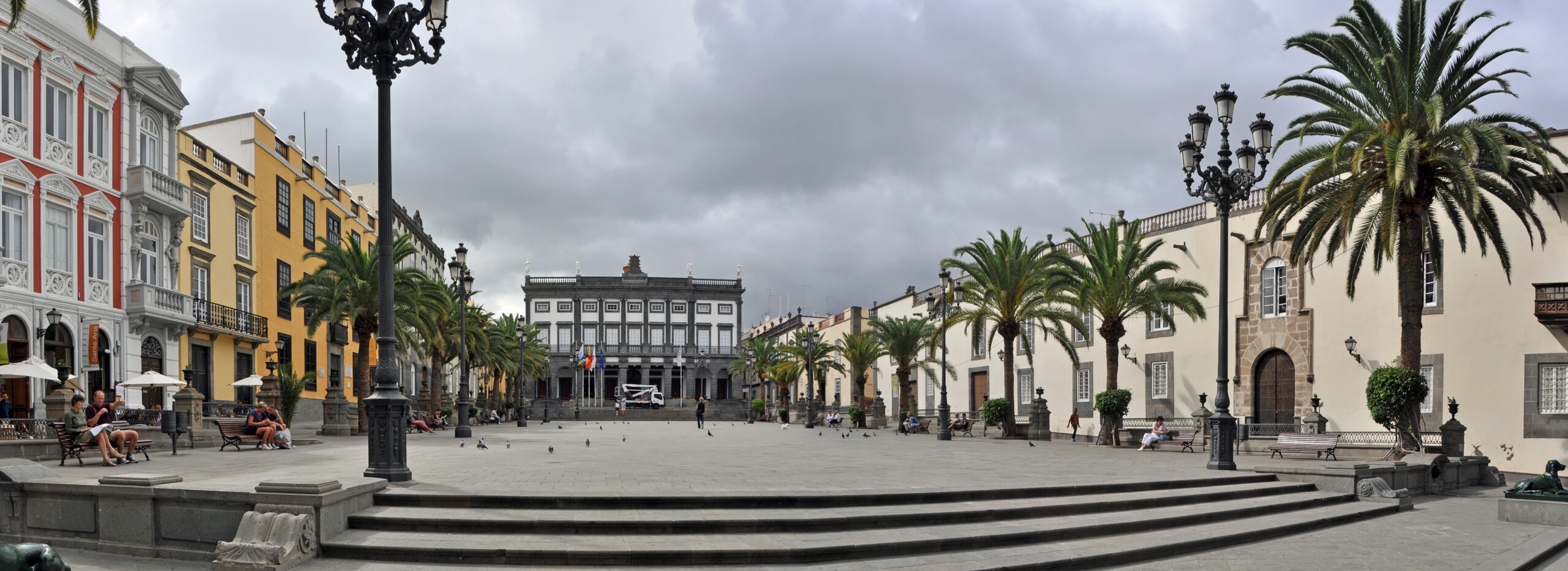Plaza de Santa Ana combines colonial façades, mature palms and open space, forming the civic square in front of the cathedral in Vegueta.