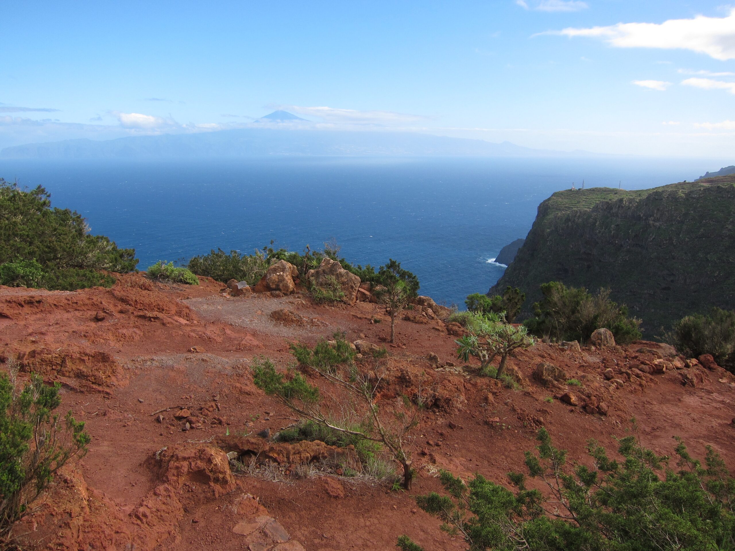 The Mirador de Abrante overlooks La Gomera's dramatic coastline, with views across the Atlantic toward Tenerife's volcanic landscape.
