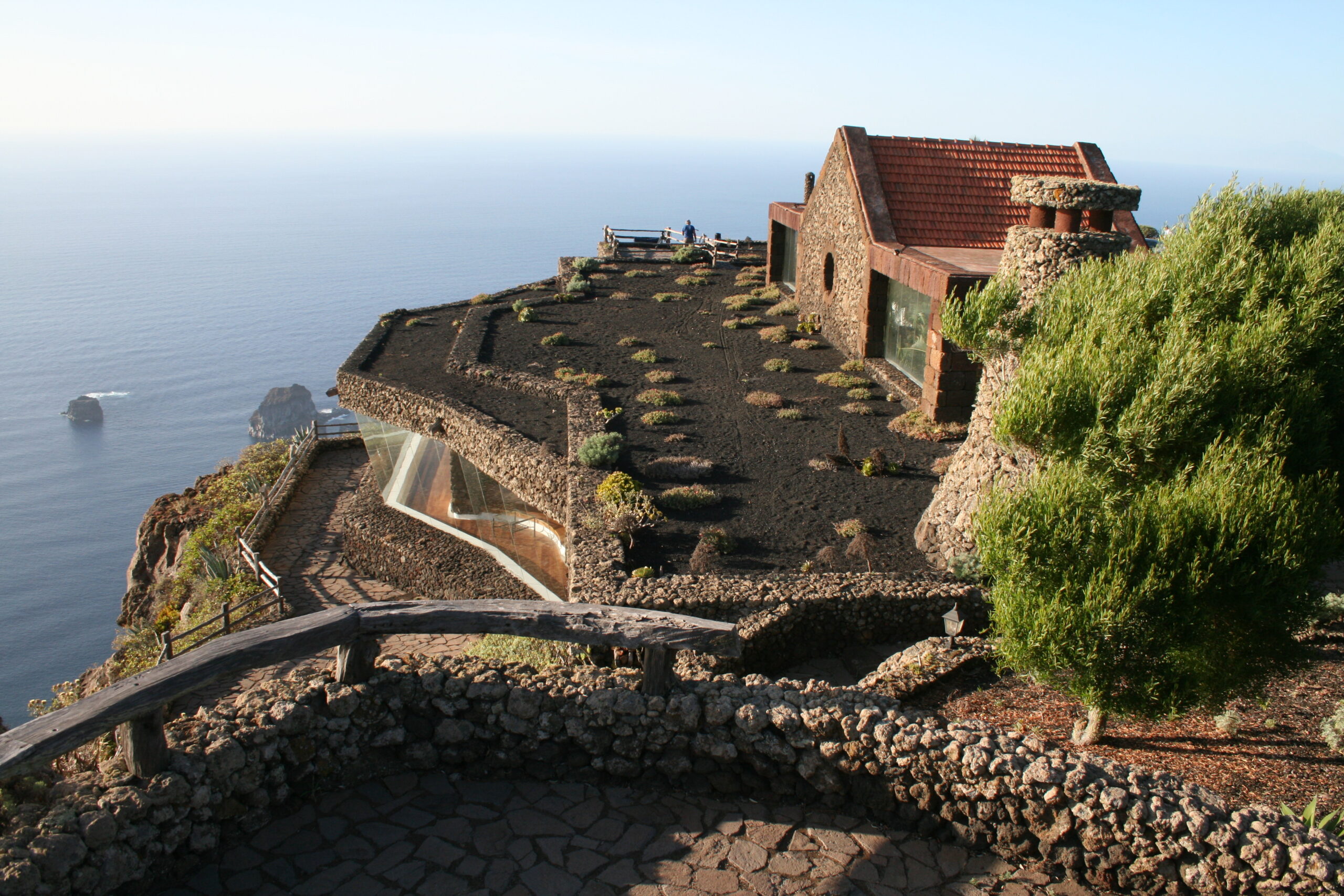 The distinctive stone structure of Mirador de la Peña sits dramatically on El Hierro's volcanic coastline.
