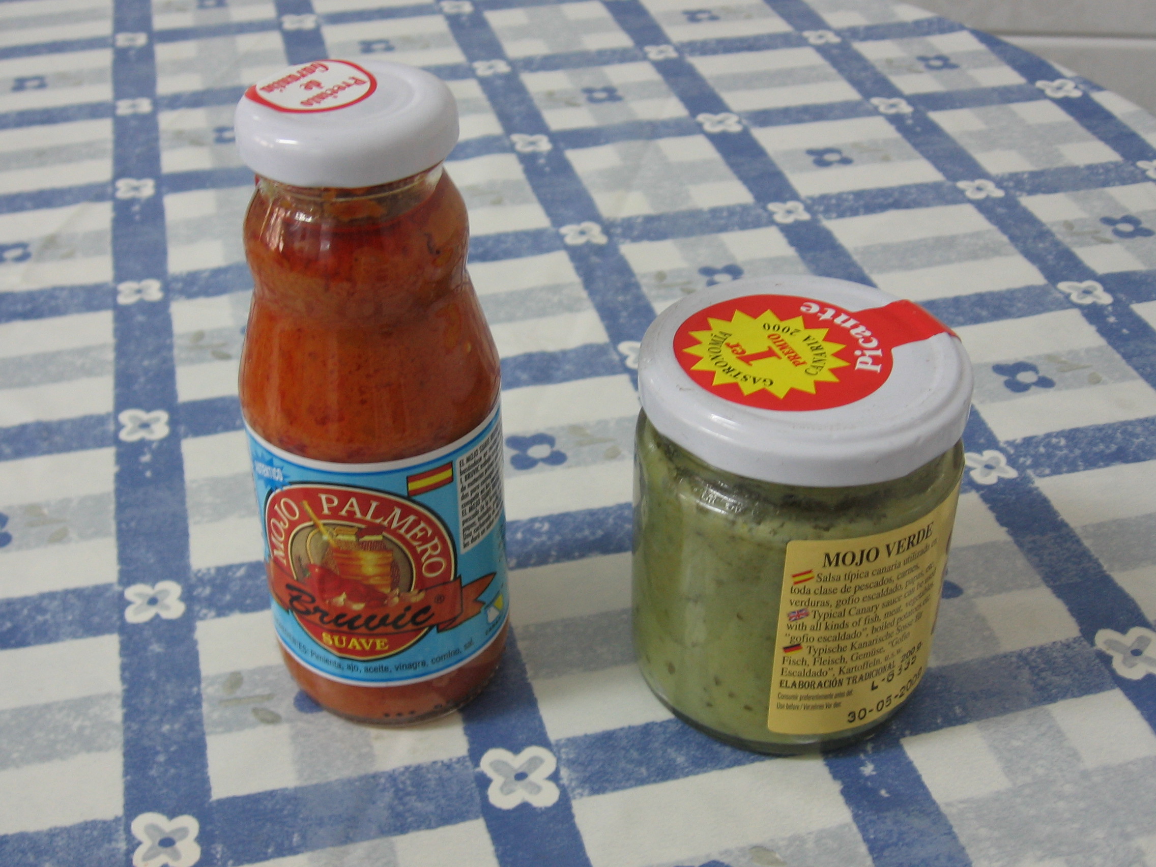 Traditional Canarian mojo sauces—the vibrant red mojo rojo and green mojo verde—are essential condiments served with nearly every meal across the islands.