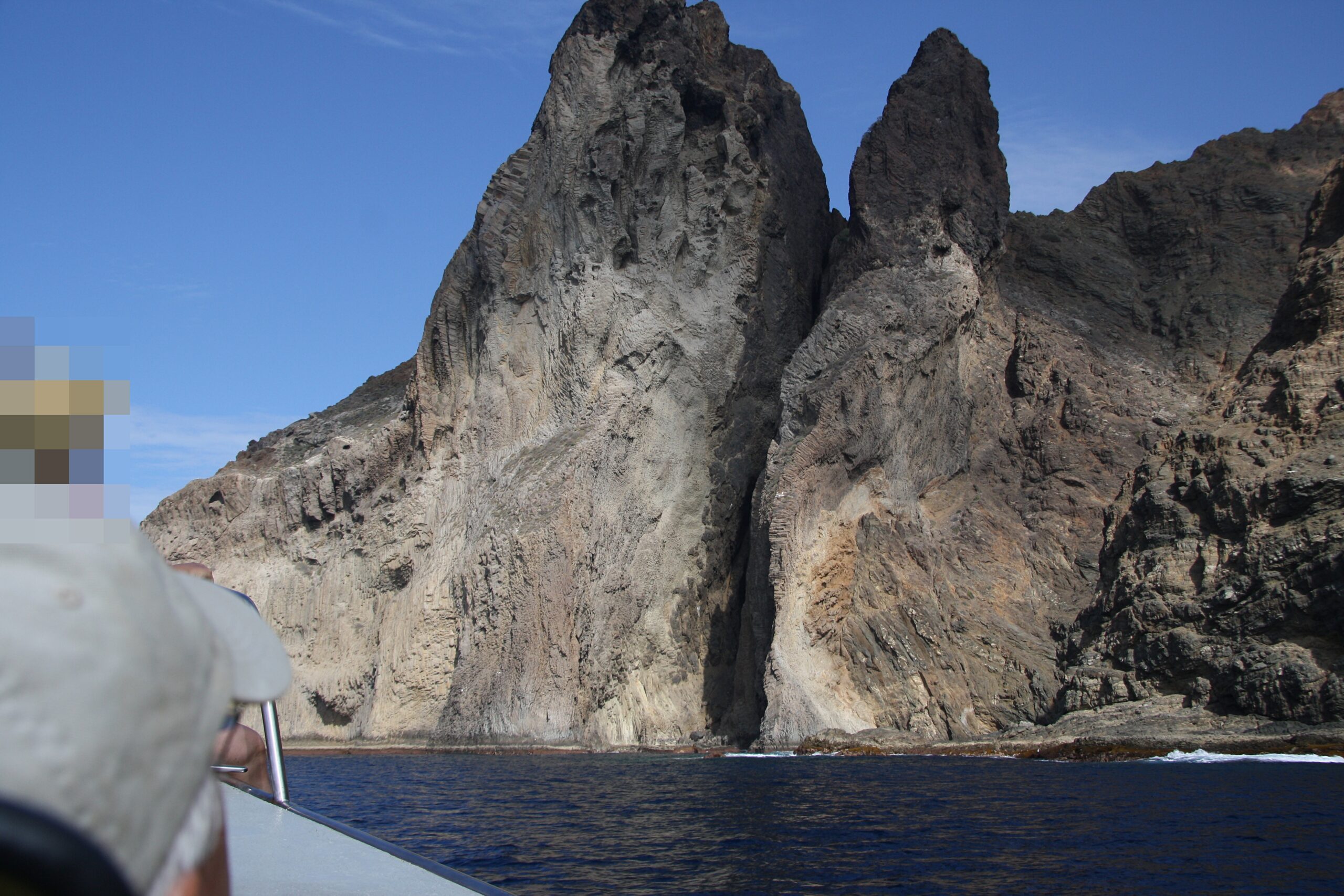 Los Órganos natural monument displays distinctive hexagonal basalt columns that rise dramatically from the ocean waters off La Gomera's north coast.