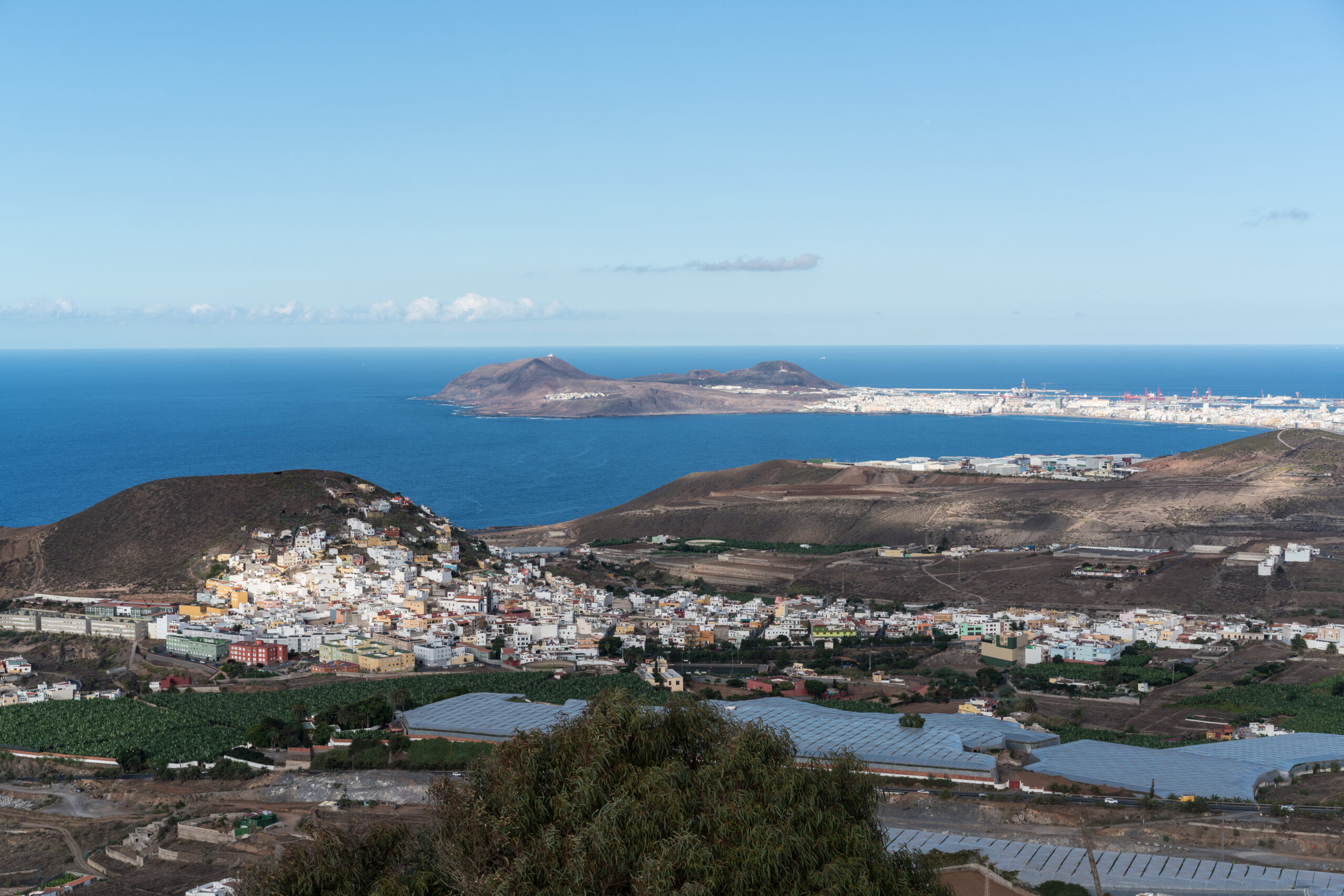 Arucas spreads across volcanic terrain, with views stretching towards neighbouring islands and the Atlantic coast.