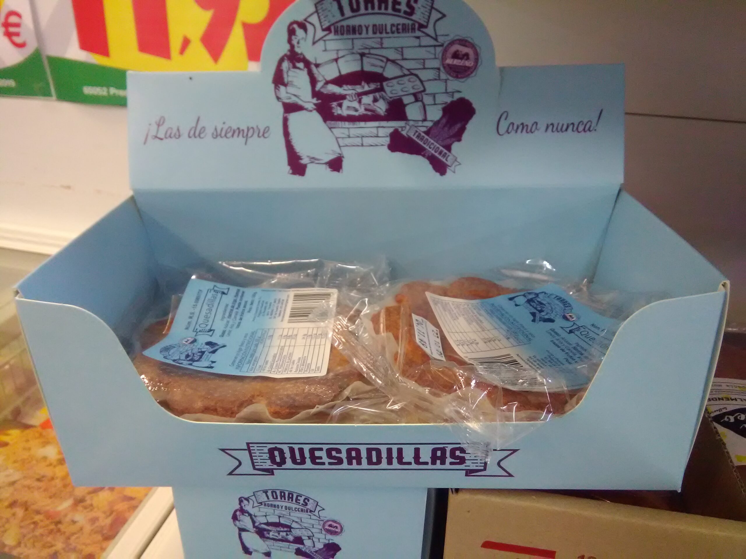 Quesadillas herreñas, a traditional local product, packaged and ready for sale.