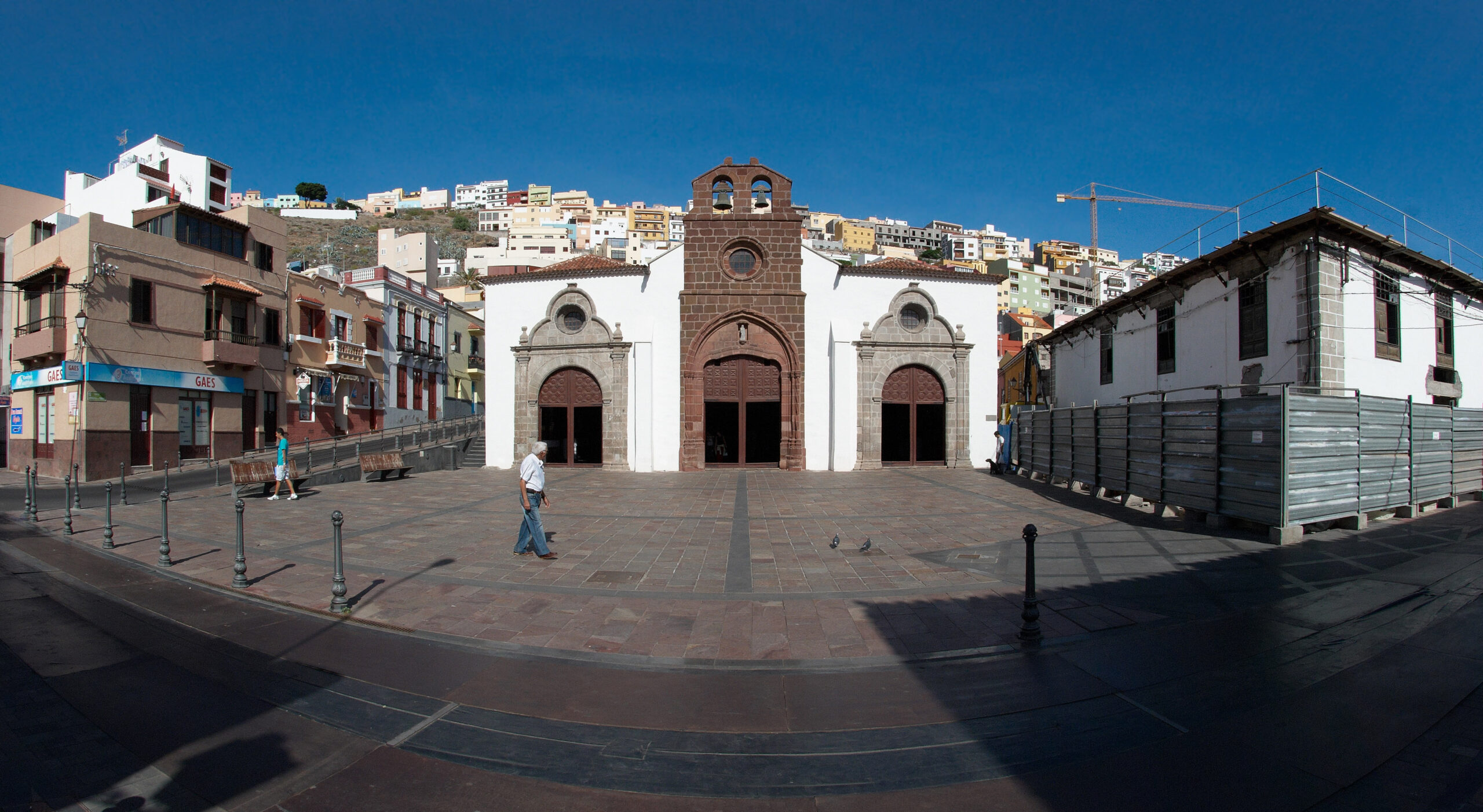 The historic church in San Sebastián’s Old Town, a whitewashed colonial structure with distinctive stone detailing overlooking the central plaza.