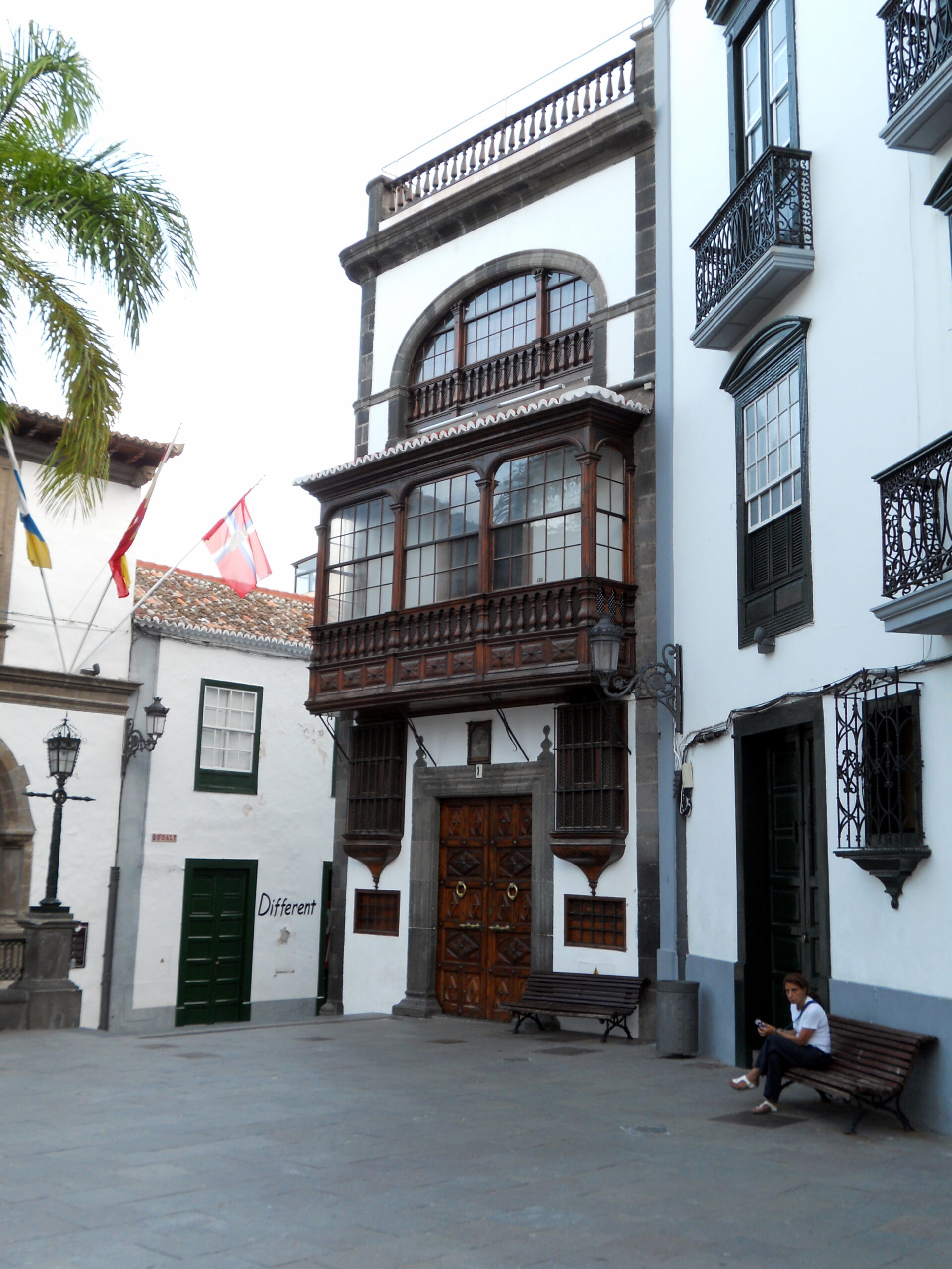 Historic colonial architecture in Santa Cruz de La Palma's Old Town, featuring traditional wooden galleries and ornate stonework typical of the Canary Islands' heritage.
